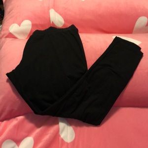 Black shin length black leggings